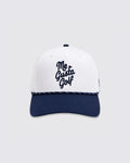 A structured baseball cap with a white crown and a navy blue curved brim. The front of the crown features the text 'Me Gusta Golf' embroidered in dark navy blue script.