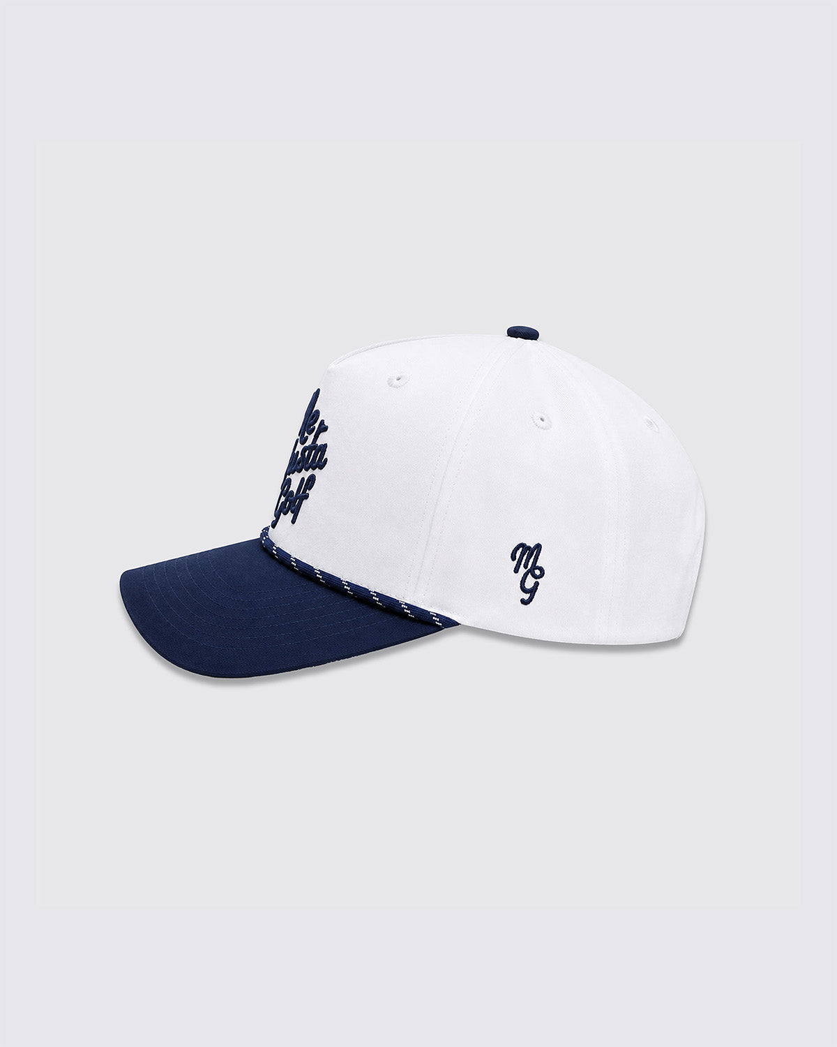 A white baseball cap with a navy blue visor, featuring navy blue embroidered script on the side and a braided navy and white rope detail along the edge of the brim, set against a light gray background.